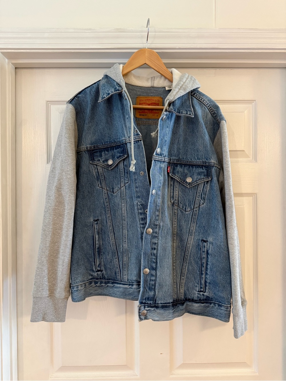 Levi's Blue Denim Trucker Jacket with Gray Hoodie Sleeves